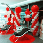 Corporate event décor featuring custom printed balloons, branded installations, and modern event design trends for 2026.